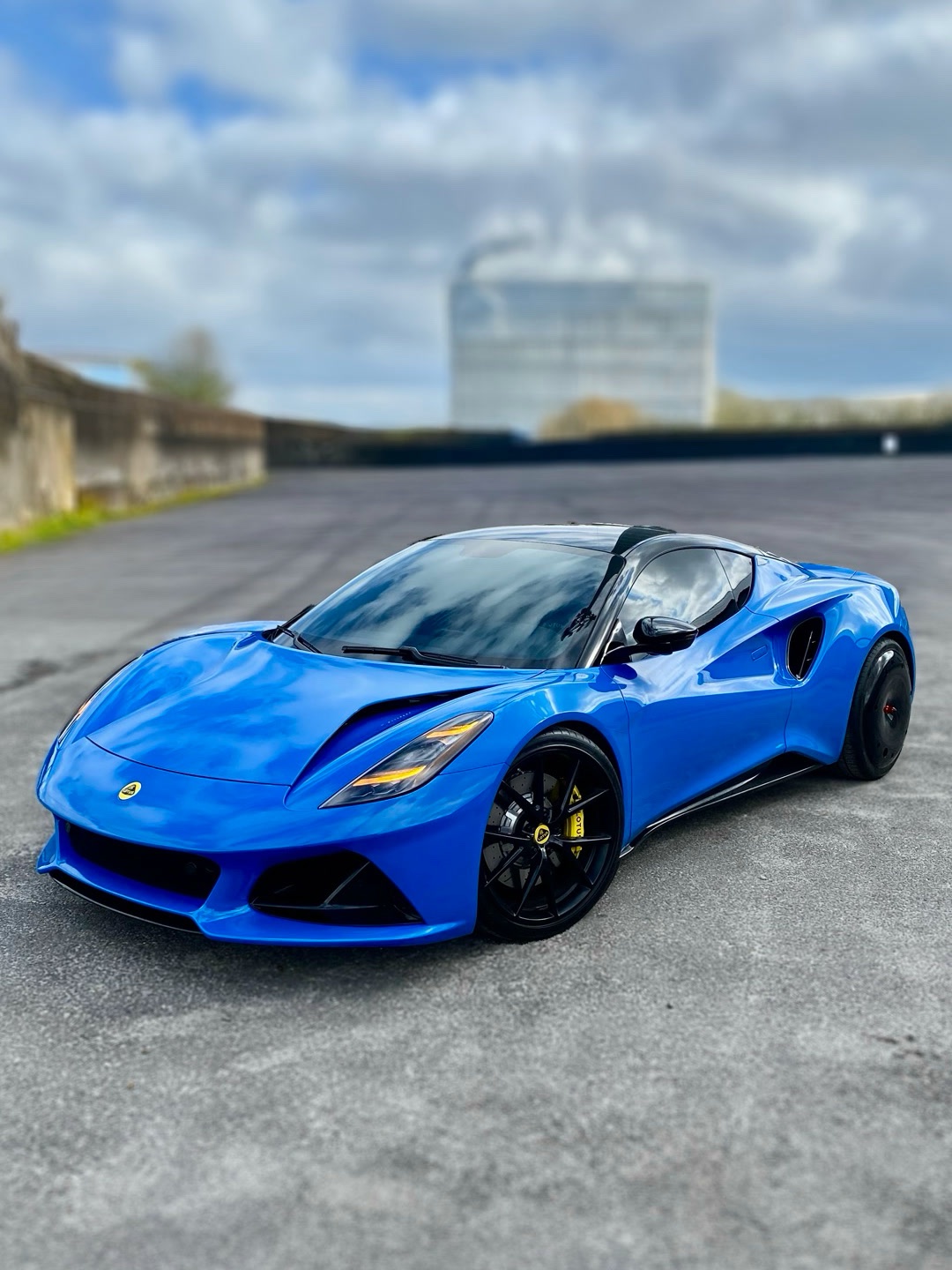 Blue Lotus Emira with the factory wheel on the front and an AIRODISC fitted to the rear